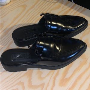 Black faux patent leather slip on shoe